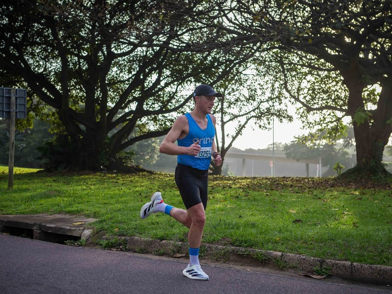 Marathon runner crossing the finish line